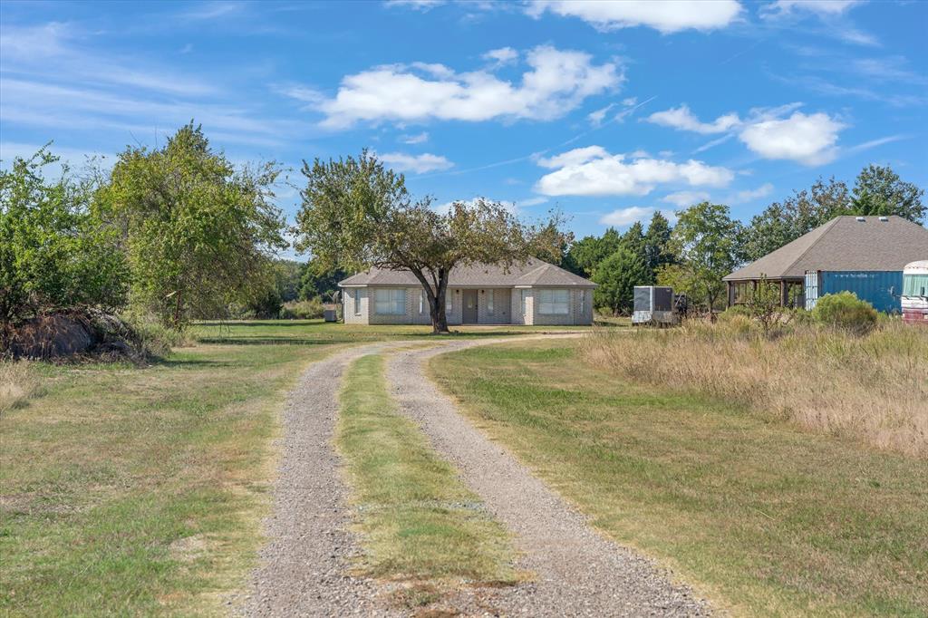 337 County Road 2719 Mabank, TX 75147 - Photo 2 of 19 a swimming pool with outdoor seating and yard