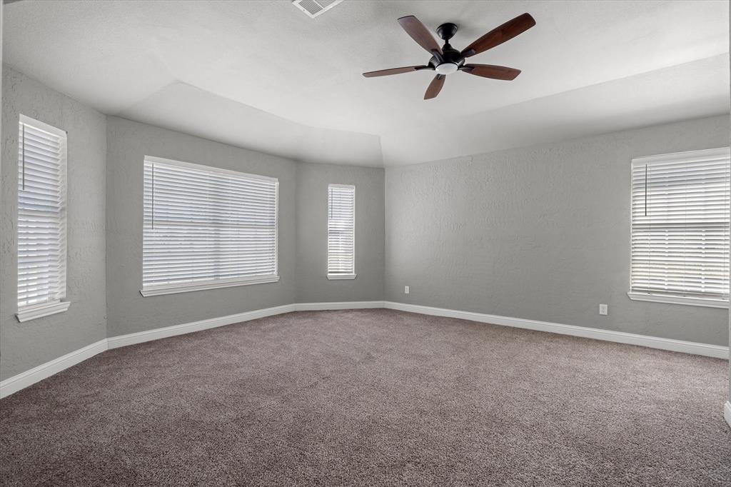 337 County Road 2719 Mabank, TX 75147 - Photo 7 of 19 wooden floor in an empty room with a window