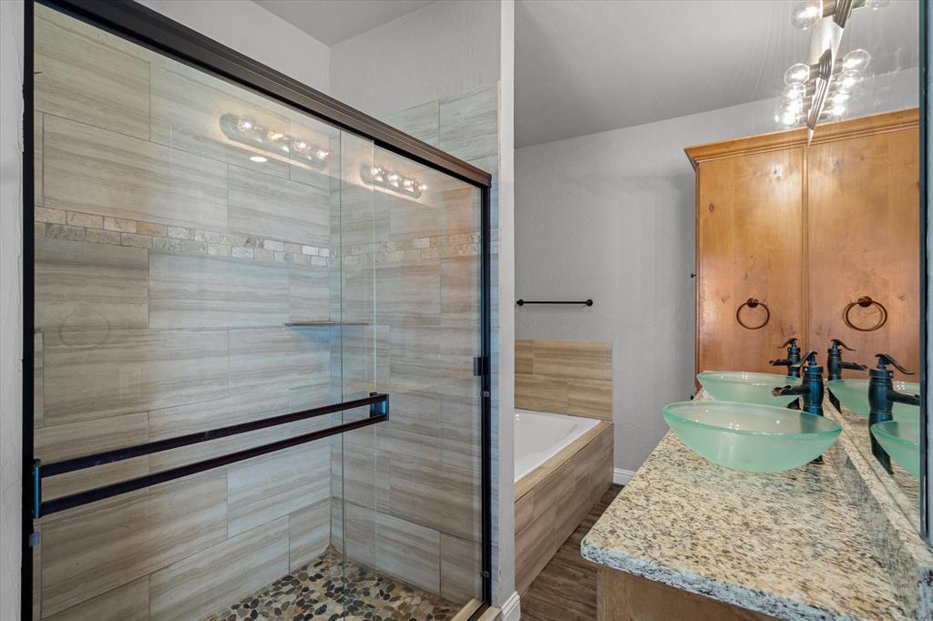 337 County Road 2719 Mabank, TX 75147 - Photo 8 of 19 a bathroom with a bathtub and shower