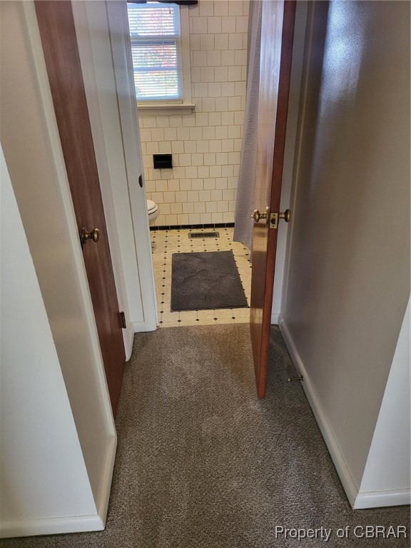 3204 West Weaver Road Hampton, VA 23666 - Photo 16 of 27 Hallway featuring dark carpet