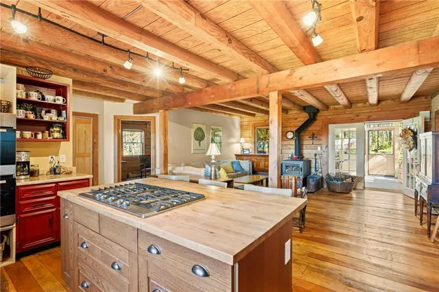 a kitchen that has a lot of cabinets in it
