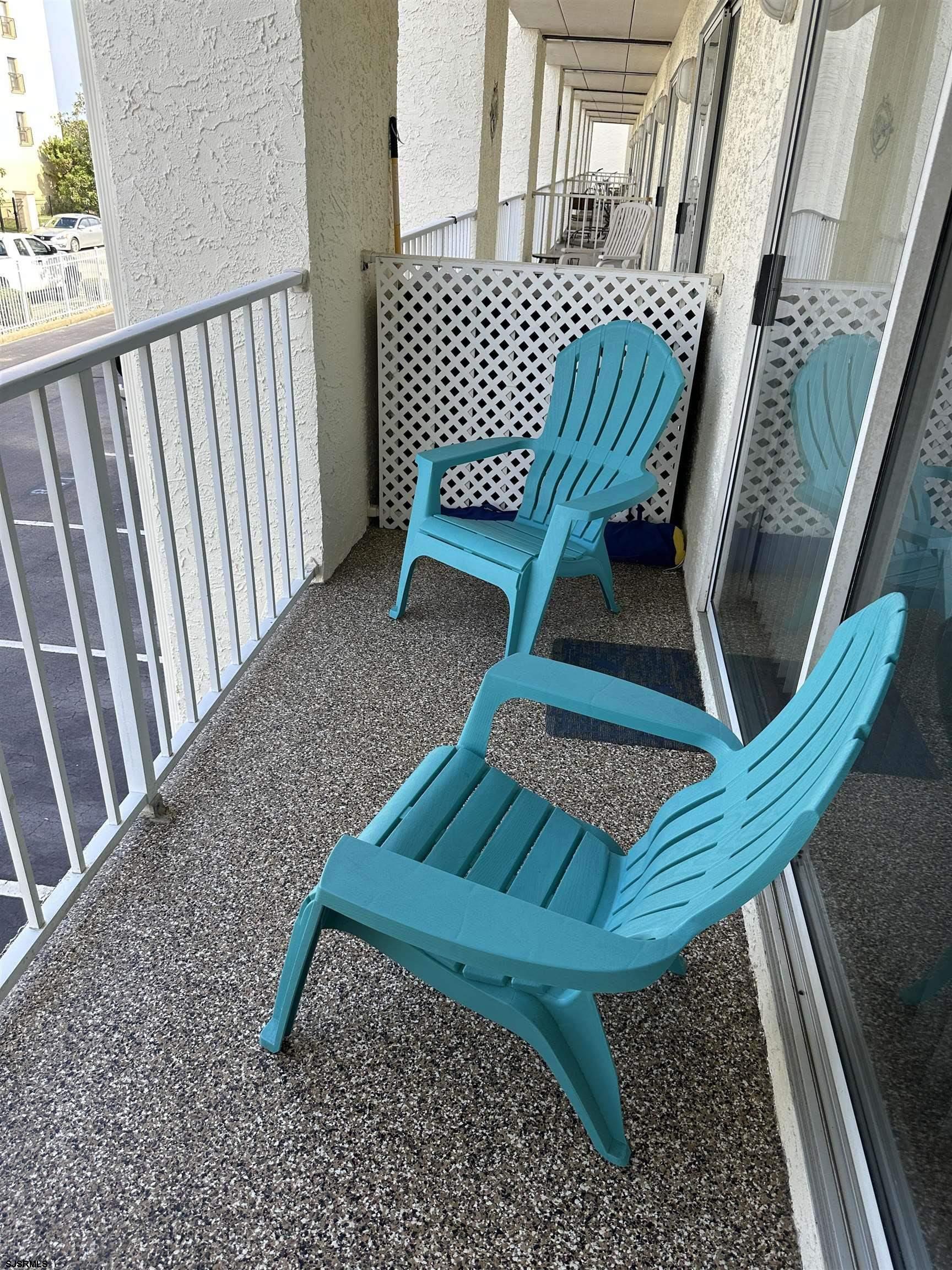 4600 West Brigantine Avenue, Unit 211 Brigantine, NJ 08203 - Photo 18 of 23 a view of a chair in wooden floor