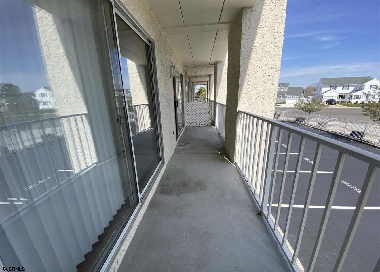 4600 West Brigantine Avenue, Unit 211 Brigantine, NJ 08203 - Photo 19 of 23 a view of a stairs and an entryway