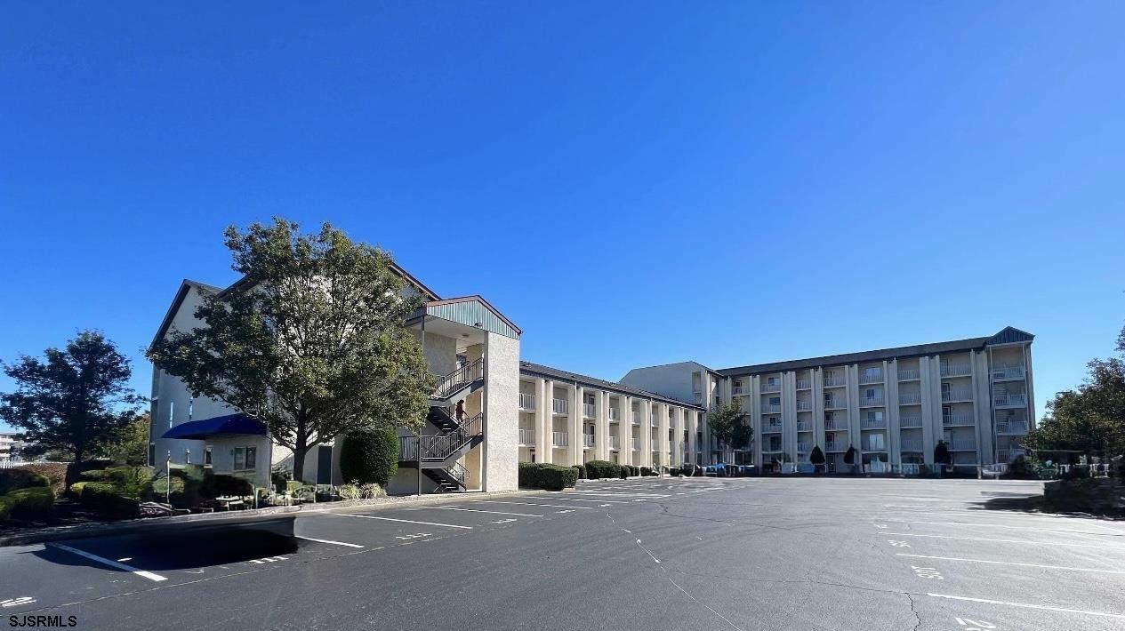 4600 West Brigantine Avenue, Unit 211 Brigantine, NJ 08203 - Photo 20 of 23 a view of a building with a street