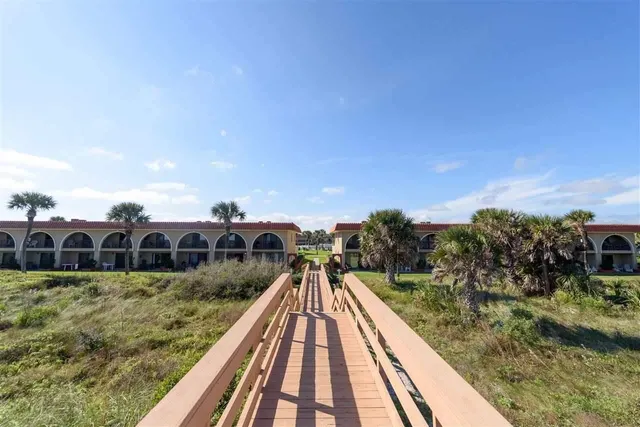 a view of residential houses with outdoor space