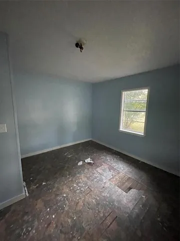 an empty room with windows