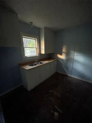 a room with furniture and window