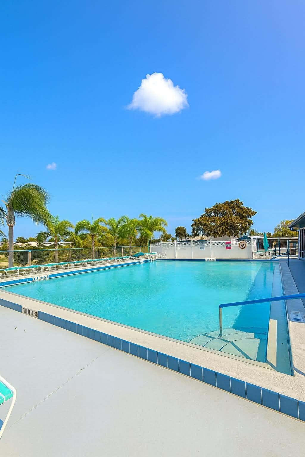 12321 Southeast 138th Avenue, Unit 216 Okeechobee, FL 34974 - Photo 28 of 34 a view of an ocean and beach