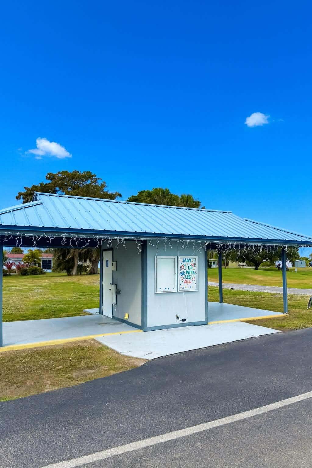12321 Southeast 138th Avenue, Unit 216 Okeechobee, FL 34974 - Photo 31 of 34 a view of swimming pool with outdoor space and seating area