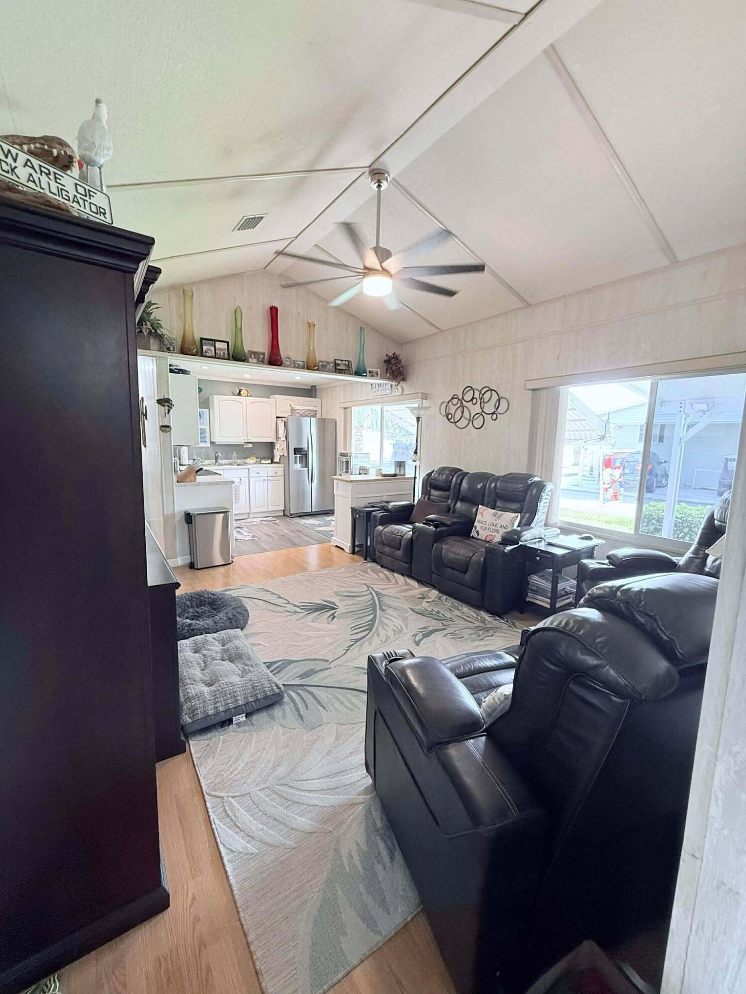 12321 Southeast 138th Avenue, Unit 216 Okeechobee, FL 34974 - Photo 8 of 34 a living room with furniture