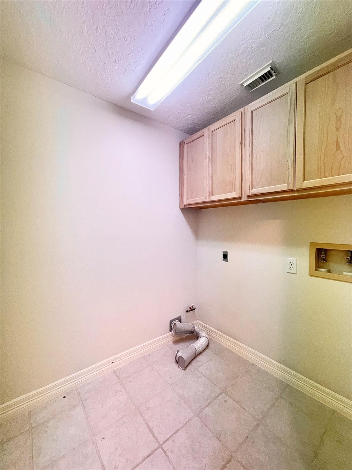 8910 Driftstone Drive Spring, TX 77379 - Photo 12 of 20 a view of a storage & utility room with wooden floor
