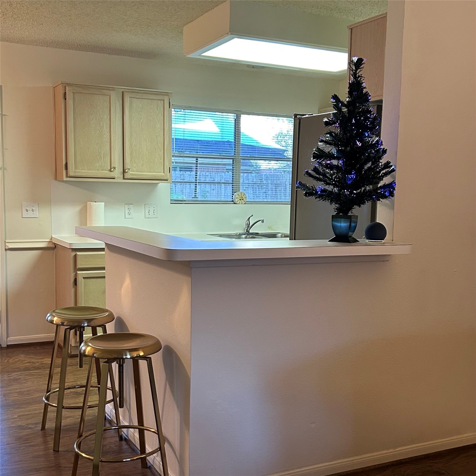 8910 Driftstone Drive Spring, TX 77379 - Photo 8 of 20 a view of a kitchen with a sink and a window