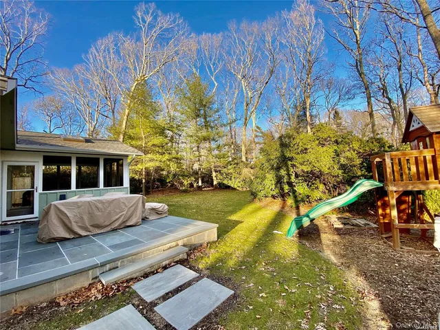 a house view with sitting space and garden