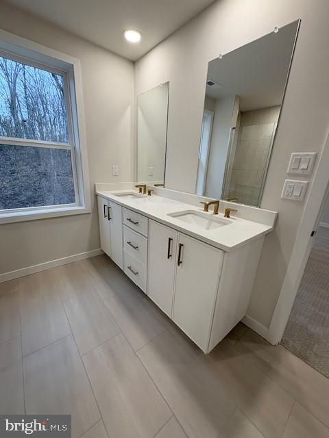 20 Grayson Lane Downingtown, PA 19335 - Photo 15 of 29 a bathroom with a double vanity sink mirror and bathtub