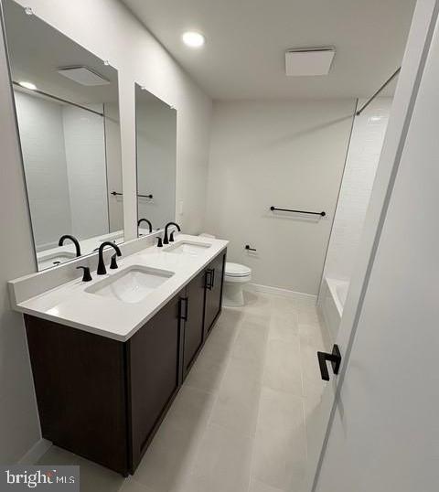 20 Grayson Lane Downingtown, PA 19335 - Photo 22 of 29 a bathroom with a sink a mirror and a toilet