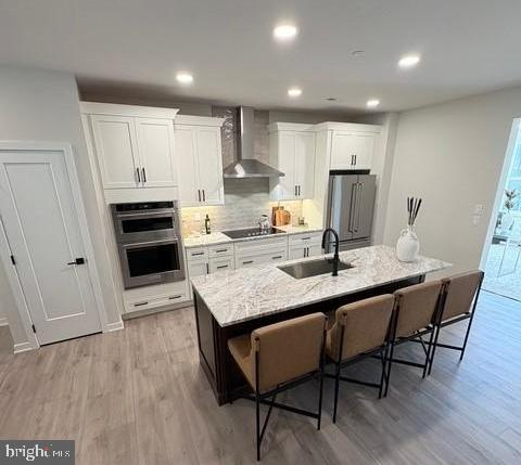 20 Grayson Lane Downingtown, PA 19335 - Photo 27 of 29 a kitchen with granite countertop a table chairs stove and cabinets
