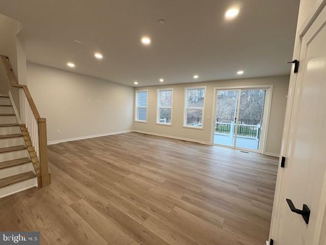 20 Grayson Lane Downingtown, PA 19335 - Photo 6 of 29 an empty room with wooden floor and windows