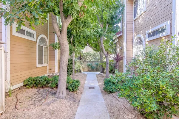 a front view of a house having yard