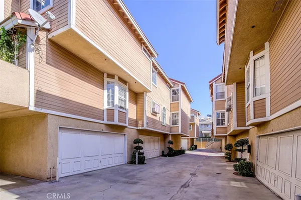 a view of a street with buildings