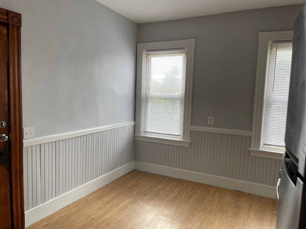 48 Hodges Avenue, Unit 2 Taunton, MA 02780 - Photo 7 of 11 a view of an empty room with a window
