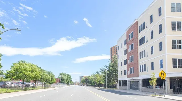 a view of a building and a street