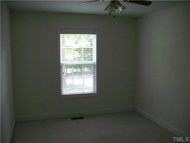 5701 Novaglen Road Durham, NC 27712 - Photo 9 of 12 an empty room with a window