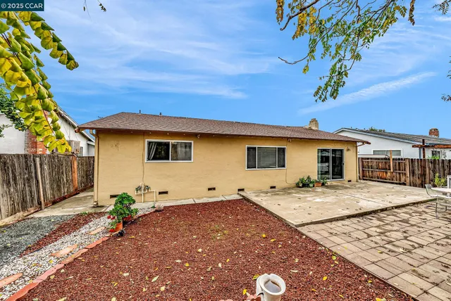 a house view with a backyard space