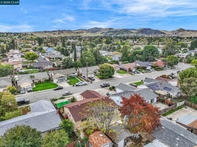 a view of a city with a lake