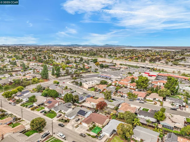 an aerial view of residential building with parking space