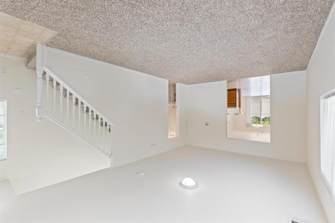 4347 Mathias Way Merced, CA 95348 - Photo 4 of 20 a view of an empty room with windows