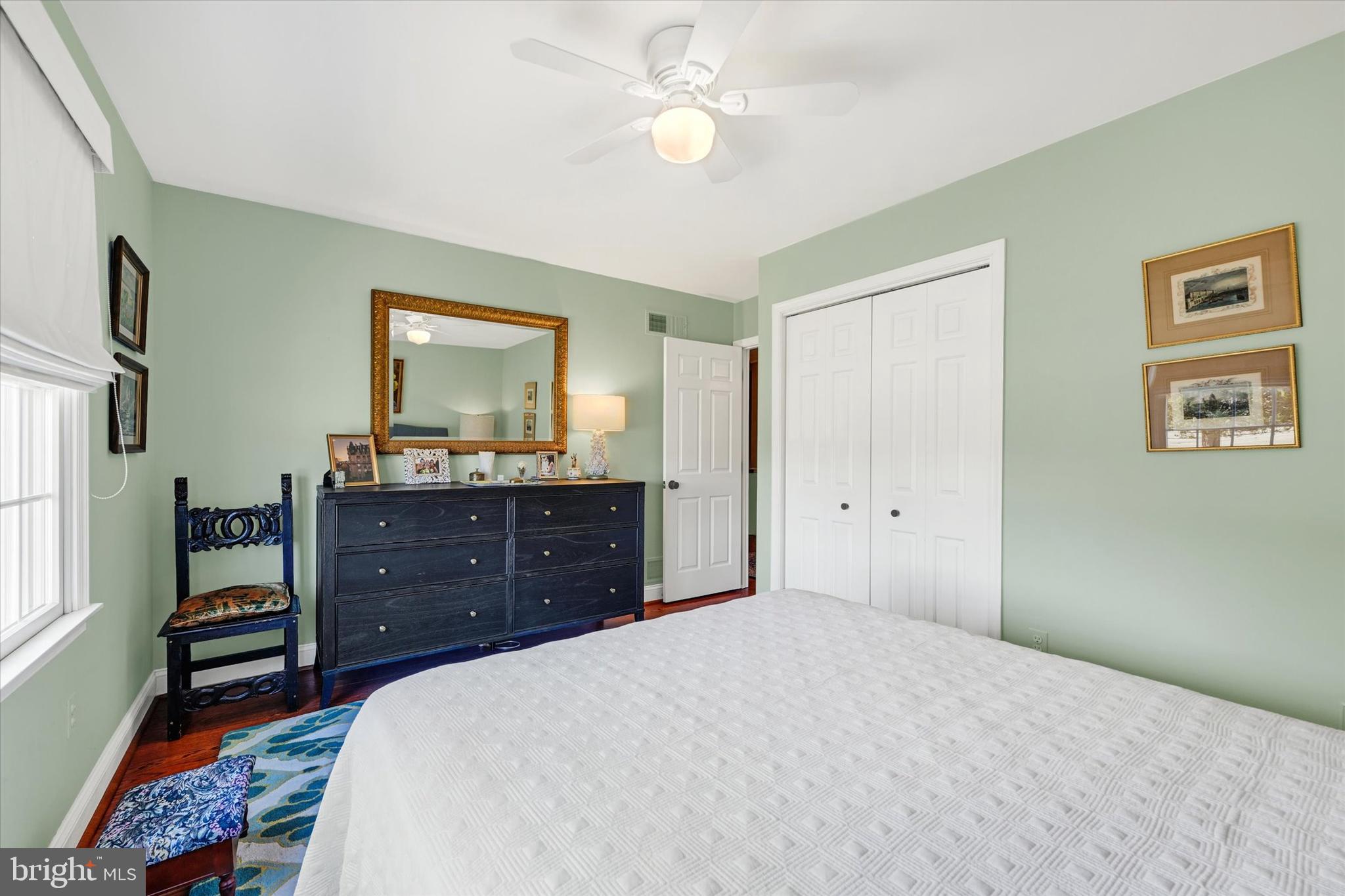 2211 Old Bosley Road Cockeysville, MD 21030 - Photo 20 of 65 a bedroom with a bed and a chandelier
