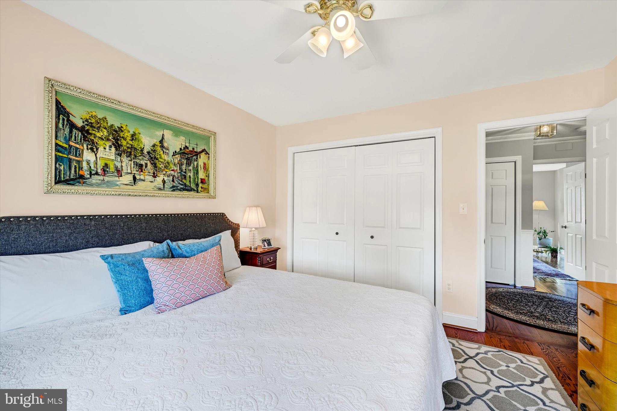 2211 Old Bosley Road Cockeysville, MD 21030 - Photo 24 of 65 a bedroom with a bed and a chandelier