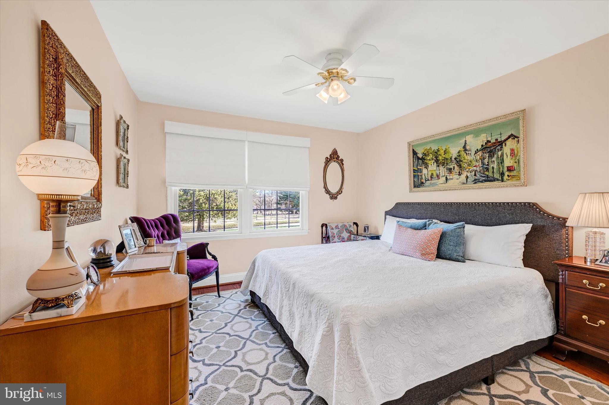 2211 Old Bosley Road Cockeysville, MD 21030 - Photo 25 of 65 a bedroom with a bed and a chandelier