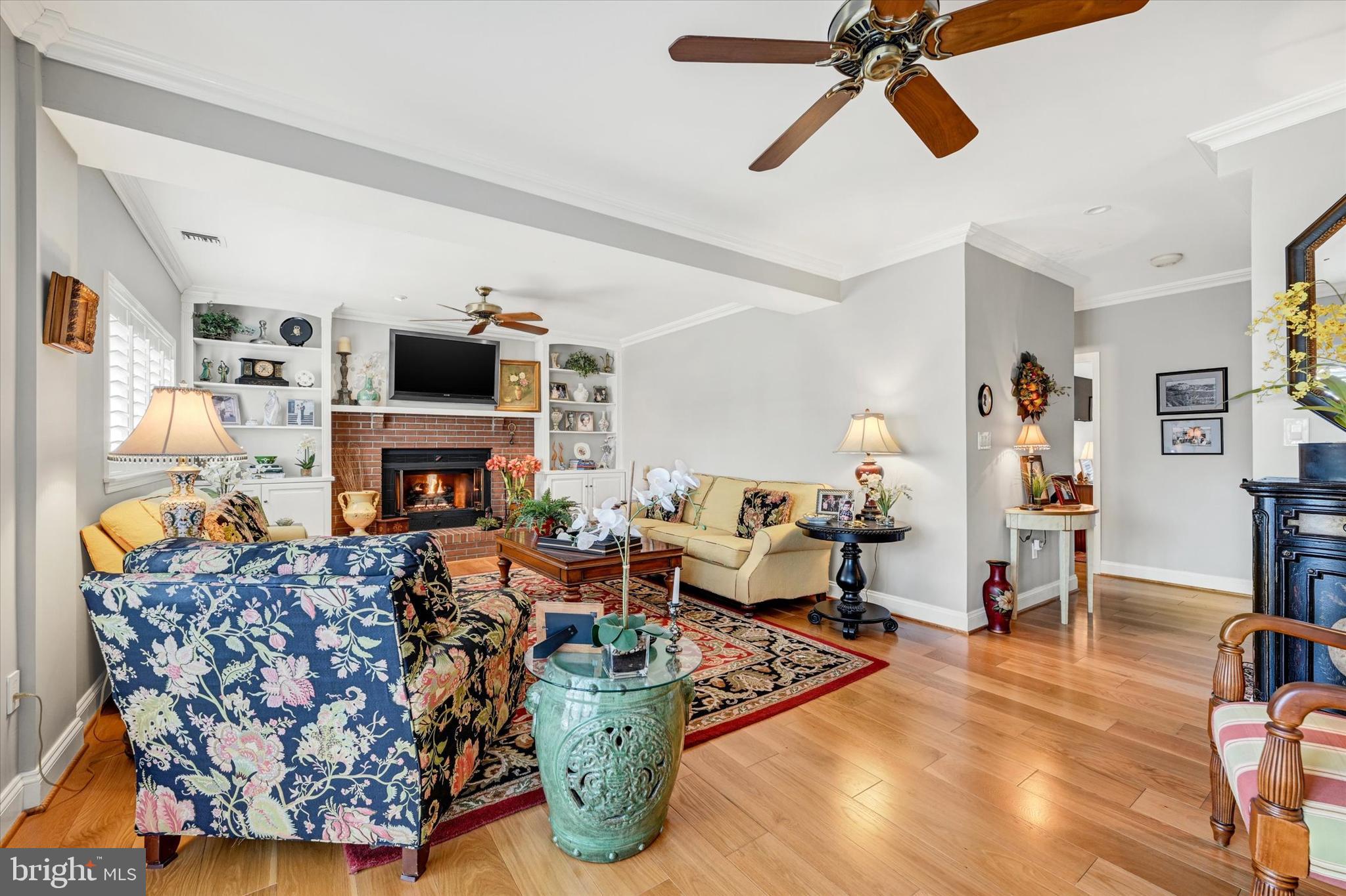 2211 Old Bosley Road Cockeysville, MD 21030 - Photo 27 of 65 a living room with furniture and a fireplace