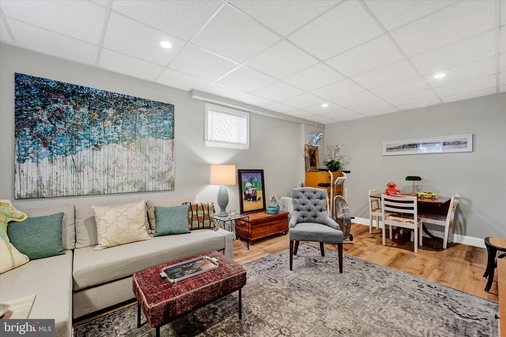 2211 Old Bosley Road Cockeysville, MD 21030 - Photo 35 of 65 a living room with furniture a rug and a lamp
