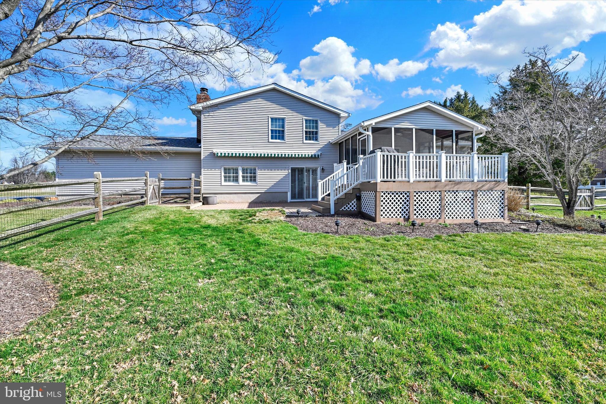 2211 Old Bosley Road Cockeysville, MD 21030 - Photo 46 of 65 a front view of a house with a yard