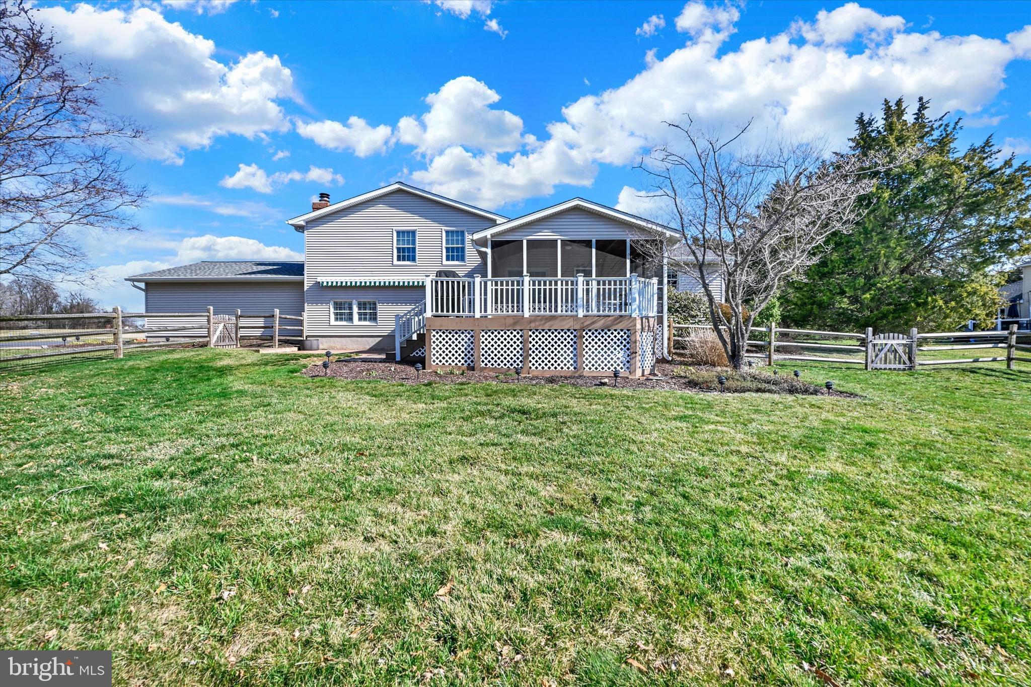 2211 Old Bosley Road Cockeysville, MD 21030 - Photo 49 of 65 a front view of a house with a yard