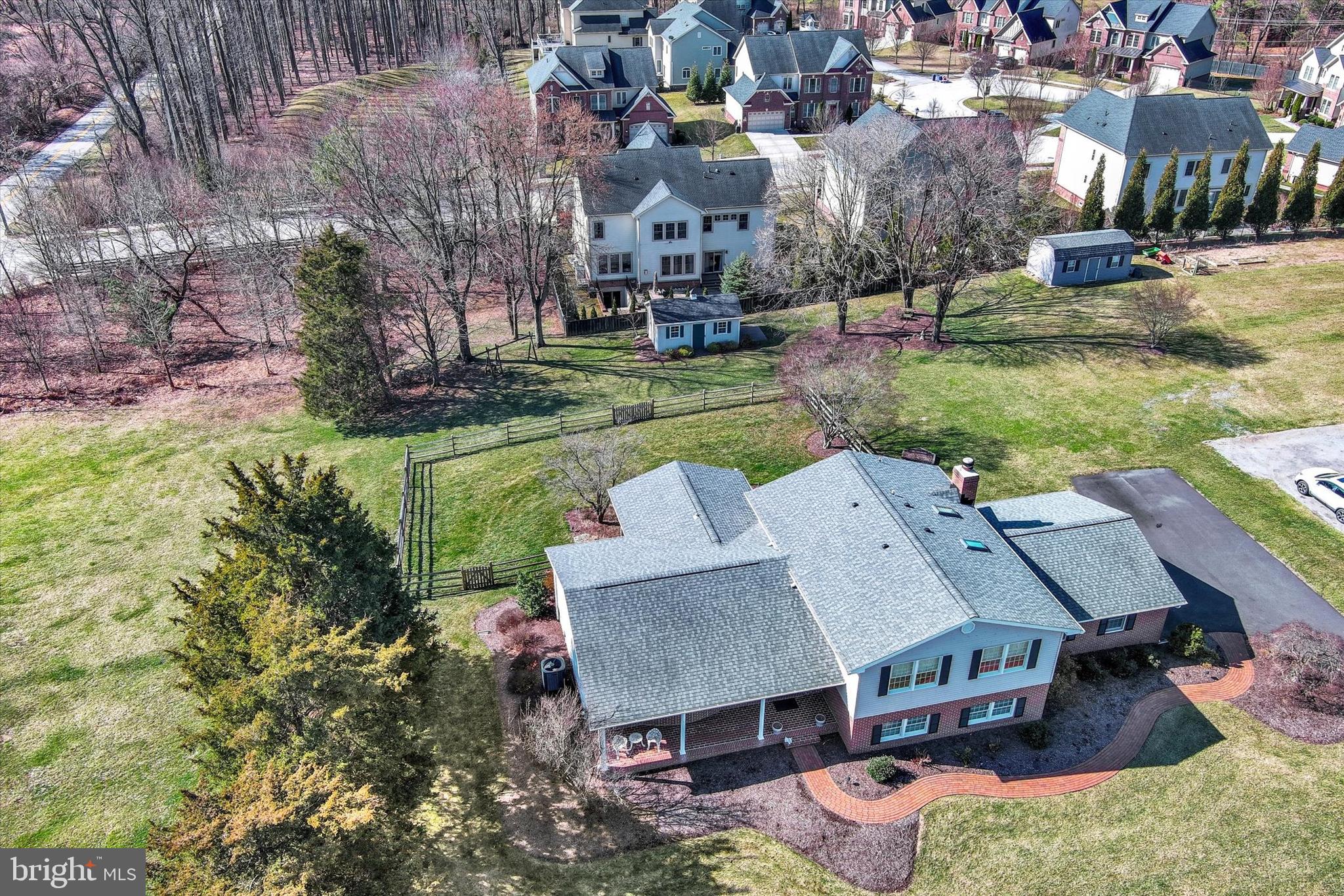 2211 Old Bosley Road Cockeysville, MD 21030 - Photo 59 of 65 an aerial view of a house with garden space and street view