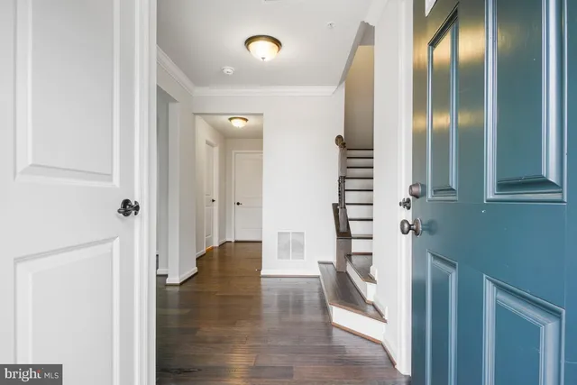 a view of front door with hallway