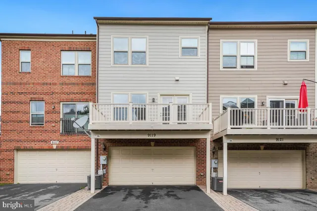 a front view of a building with a road