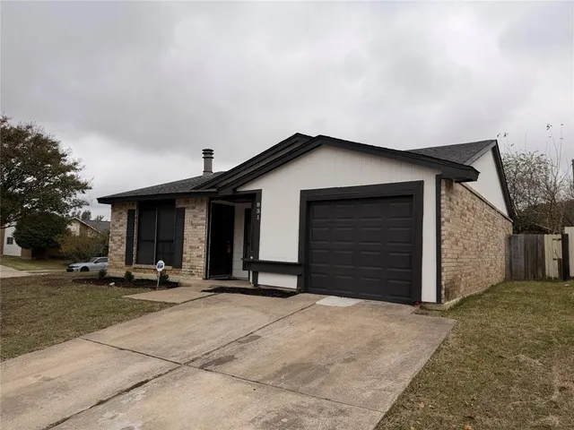 a view of a house with a patio