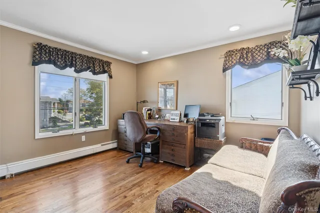 a workspace with furniture and a window