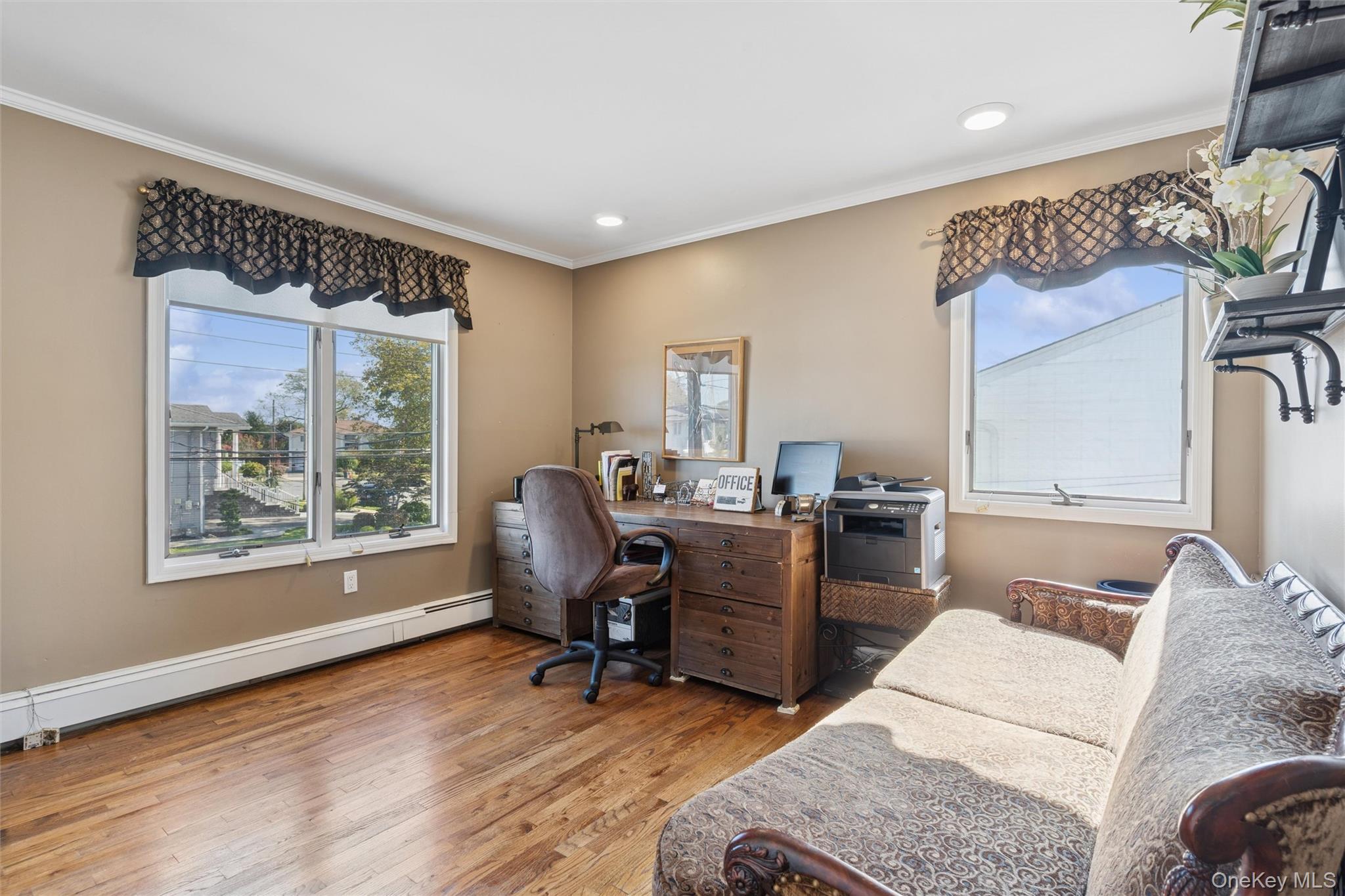 2858 Shore Road Bellmore, NY 11710 - Photo 16 of 38 a workspace with furniture and a window