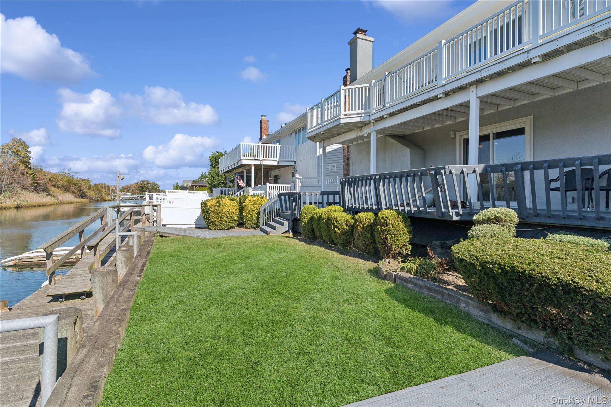 2858 Shore Road Bellmore, NY 11710 - Photo 26 of 38 a view of a house with a yard and furniture