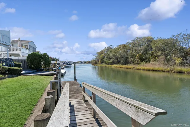 a view of a lake with a yard