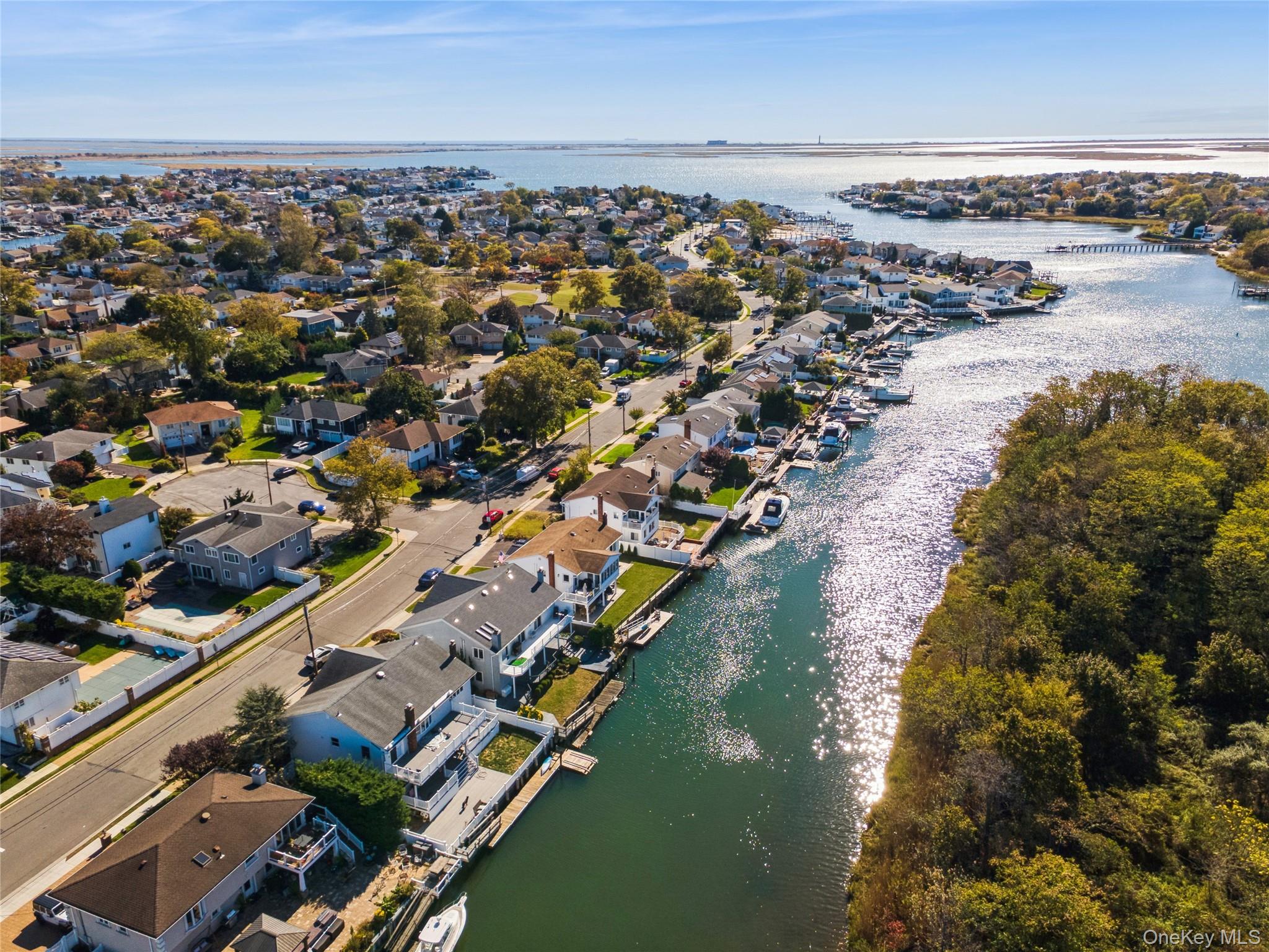 2858 Shore Road Bellmore, NY 11710 - Photo 34 of 38 an aerial view of residential houses with outdoor space