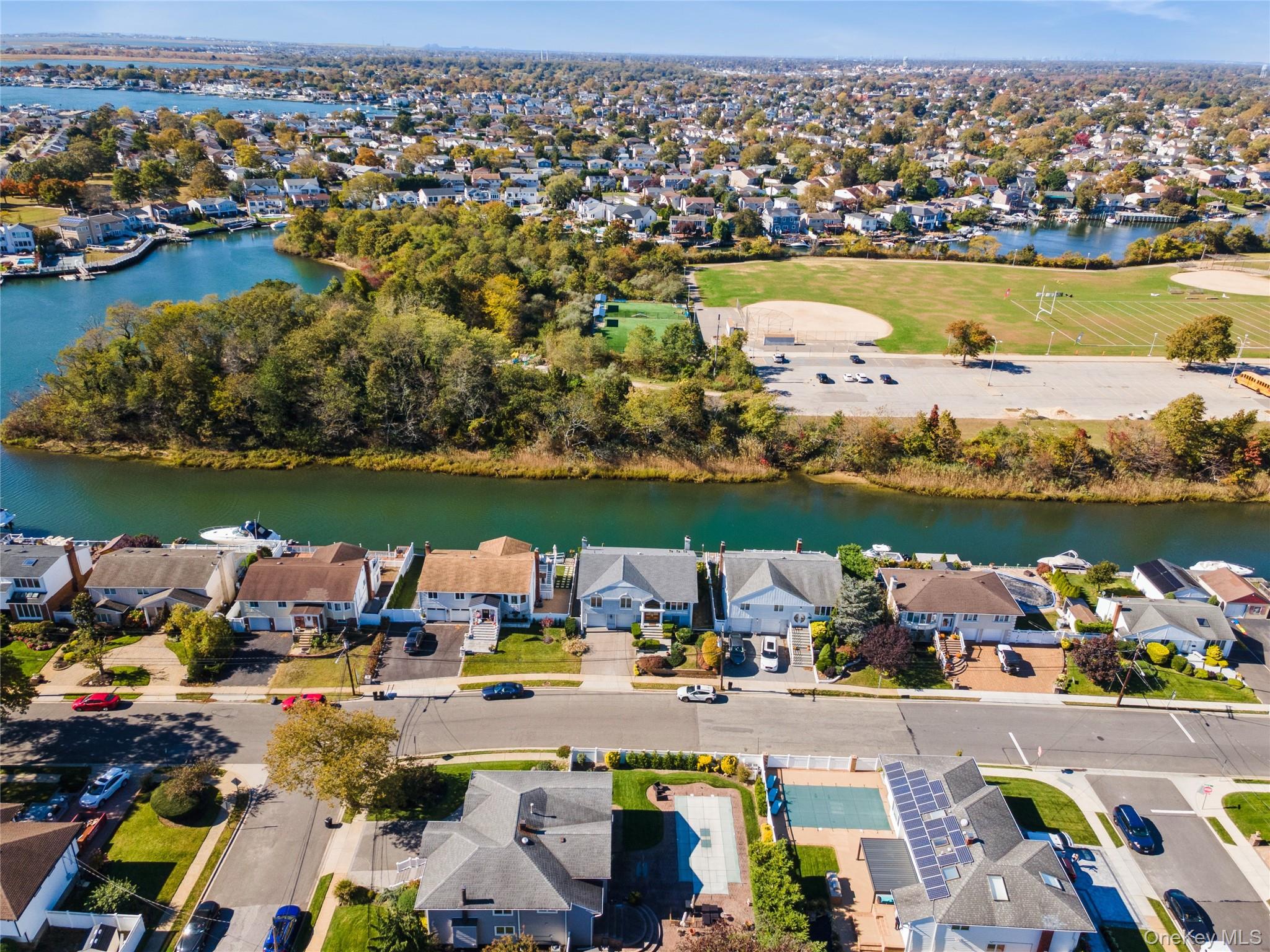 2858 Shore Road Bellmore, NY 11710 - Photo 35 of 38 an aerial view of a houses with outdoor space