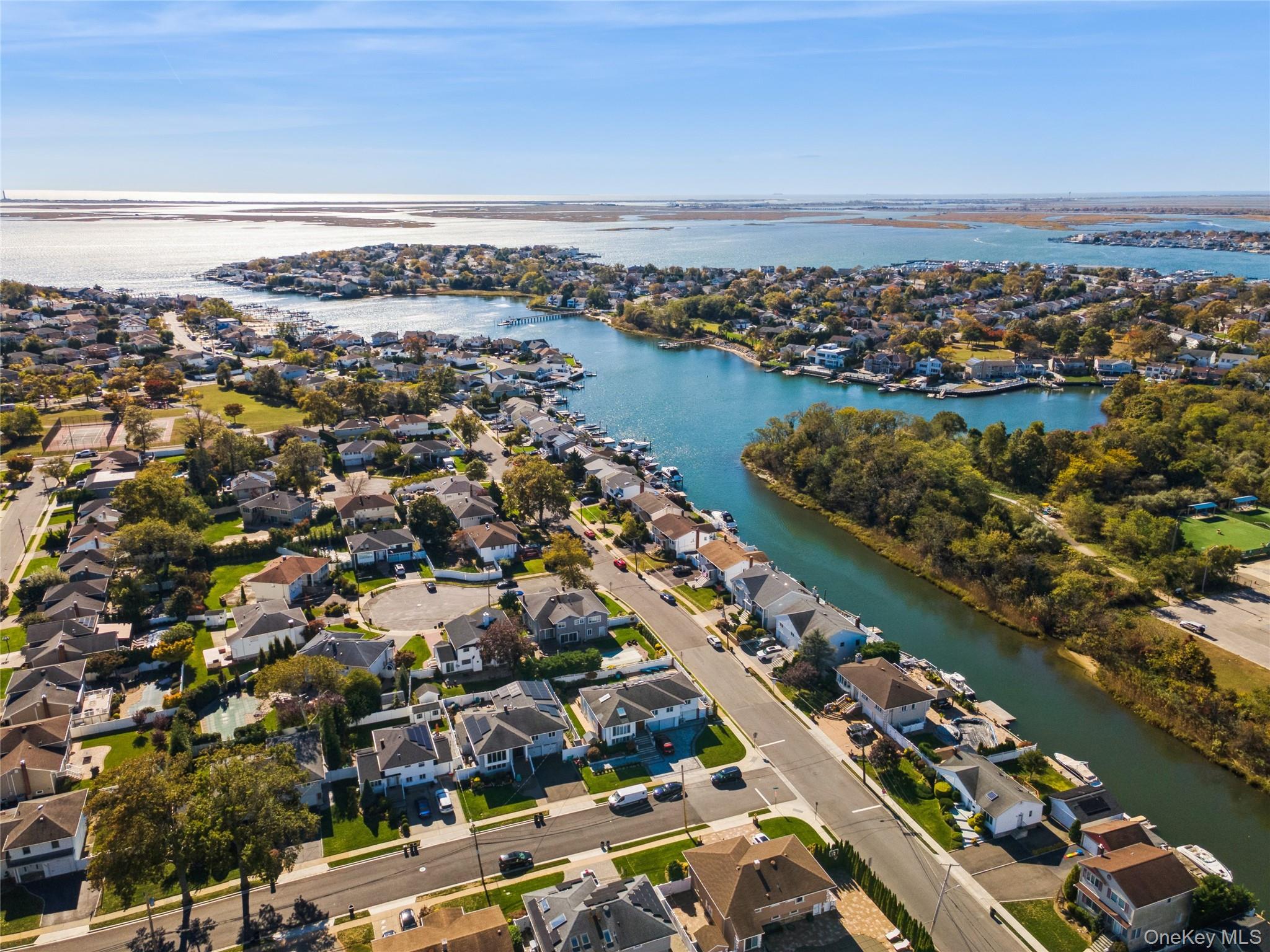 2858 Shore Road Bellmore, NY 11710 - Photo 38 of 38 an aerial view of city and lake