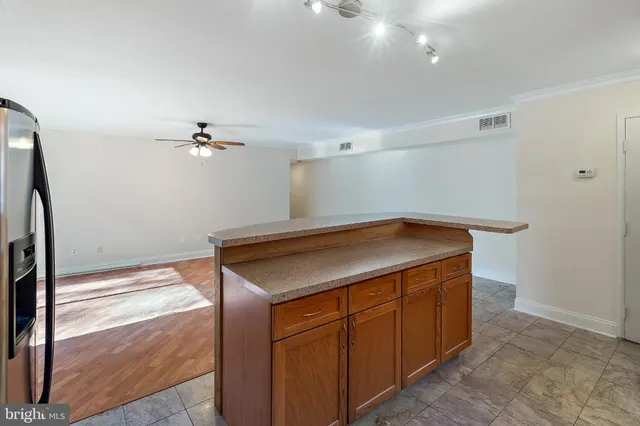 a kitchen with a cabinets and a sink