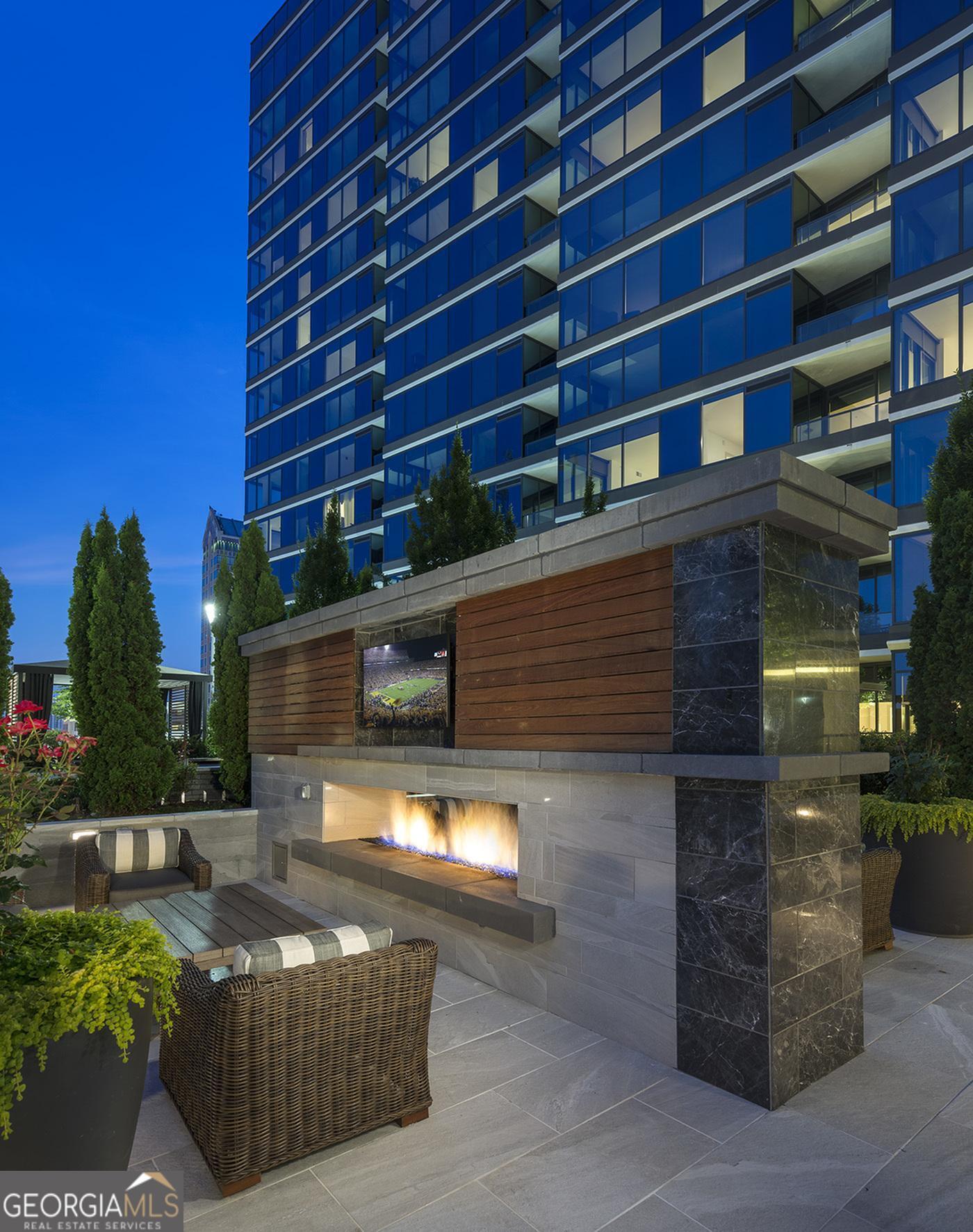 3150 Roswell Road Northwest, Unit 620 Atlanta, GA 30305 - Photo 16 of 26 a front view of a building with outdoor space